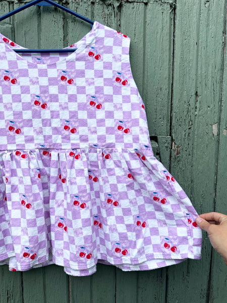 Adult large sleeveless peplum top